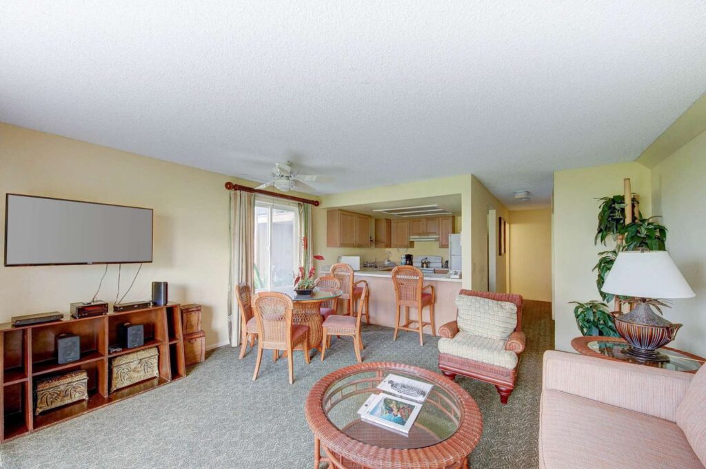 Living room and kitchen in a Pono Kai Resort 2 Bedroom Unit